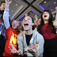 Pro-union supporters celebrate as Scottish independence referendum results are returned at a \'Better Together\' event in Glasgow, Scotland. | AFP-JIJI