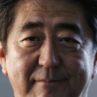 A slew of erroneous articles in the Asahi Shimbun, a quieting of liberal views and an absence of strong political opposition could create a tailwind for conservatives such as Prime Minister Shinzo Abe. | REUTERS