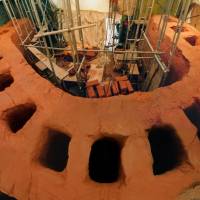 This acoustic shell is part of an all-clay amphitheater being built by two foreign ceramics artists in Mihama, Aichi Prefecture. Made of clay donated by a local tile maker, it is designed to direct sound from the stage to the audience. . | STEVEN WARD/CHUNICHI SHIMBUN