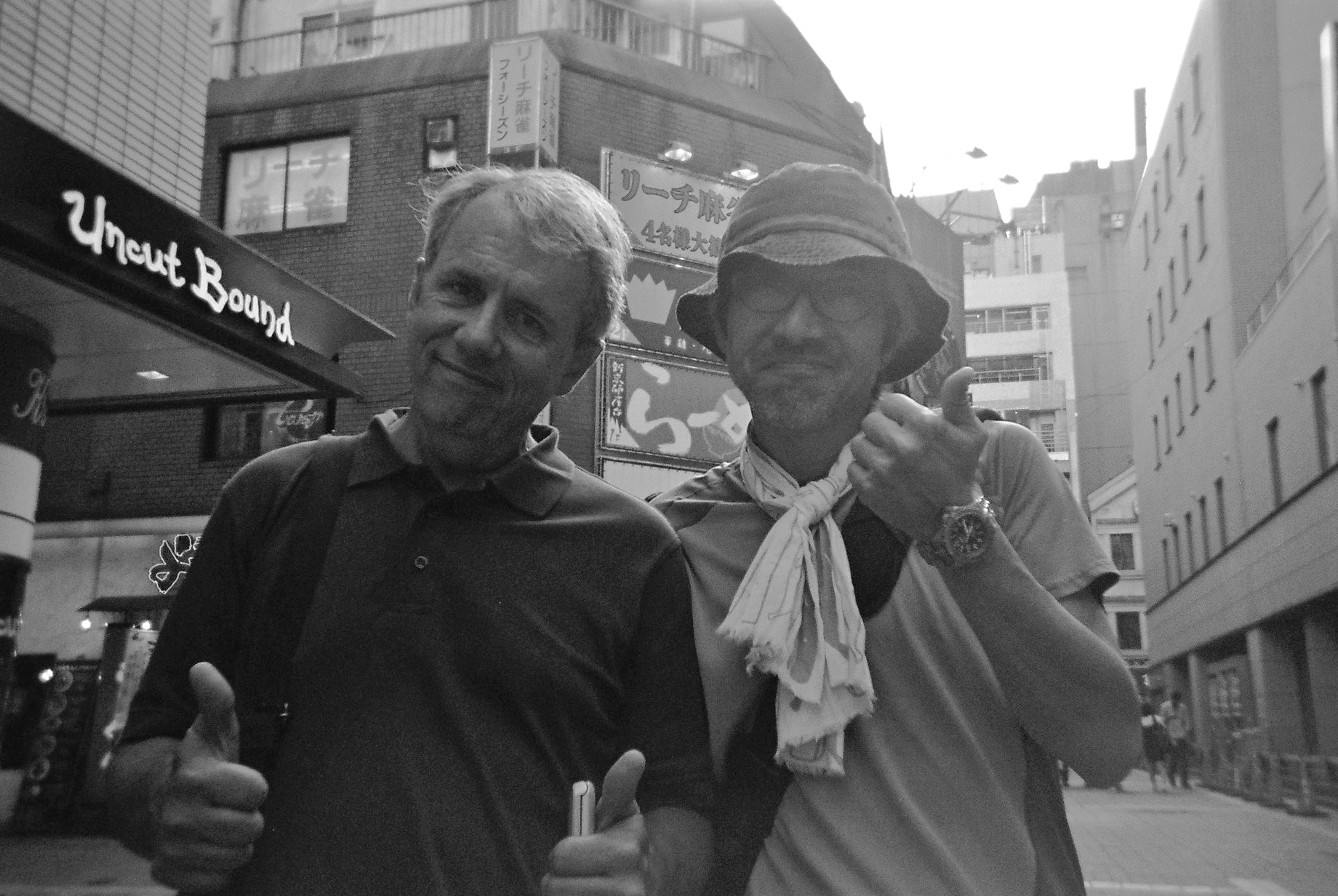 Hanging in there: Mark Schilling (left) and director Shinji Imaoka in Shinjuku in 2014. | MIRI MATSUFUJI