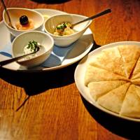 A trio of meze starters with pita bread at Kaze no Kura in Shinjuku. | ALEX DUTSON