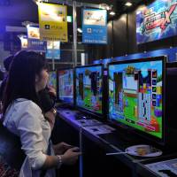 The Tokyo Game Show offers gamers a hands-on preview of what is about to hit the market. It is also a place where they can meet like-minded enthusiasts. | YOSHIAKI MIURA