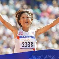 Iconic victory: Naoko Takahashi’s gold medal-winning triumph in the 2000 Sydney Olympics women’s marathon, was televised three times by NHK on the same day. Takahashi should light Olympic flame at 2020 Games