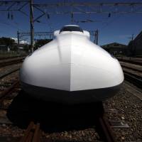 Faster than a speeding bullet: Central Japan Railway Co.\'s N700A shinkansen sits in Hamamatsu City, Shizuoka Prefecture, in August 2012. | BLOOMBERG