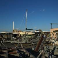 Landlubber: A small vessel is docked in boatyard adjacent to Yumenoshima’s marina. | KIT NAGAMURA