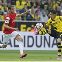 Like he never left: Shinji Kagawa made a triumphant return to Borussia Dortmund on Saturday. Kagawa capable of making most of fresh start at Dortmund