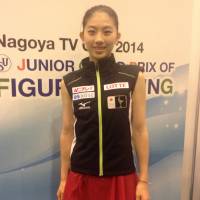 Strong finish: Yuka Nagai hits six triple jumps in the free skate on Saturday en route to a second-place finish in the women\'s program at the Junior Grand Prix in Nagoya. | JACK GALLAGHER