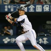 All she wrote: Takayuki Kajitani hits the game-winning run in the 11th inning of the BayStars\' 4-3 victory over the Giants on Sunday. | KYODO