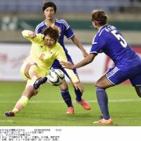 Easy does it: Mizuho Sakaguchi scores Japan\'s opening goal in a 3-0 win over Taiwan at the Asian Games on Monday. | KYODO