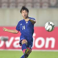 What he aimed for: Japan\'s Takuma Arano scores a goal against Palestine on Thursday at the Asian Games. Japan defeated Palestine 4-0. | KYODO