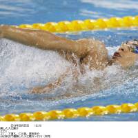 Gliding to victory: Ryosuke Irie swims in the men\'s 200-meter backstroke final at the Asian Games on Thursday. Irie won the event for the third straight Asiad with a record time of 1 minute, 53.26 seconds. | KYODO