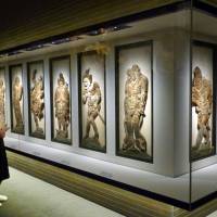 Twelve Divine Generals, carved from cypress in the 11th century, are shown in a new configuration Wednesday at Kofukuji Temple\'s National Treasure Museum in Nara. | KYODO