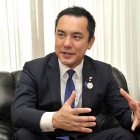 Mie Gov. Eikei Suzuki talks to The Japan Times at the prefecture\'s Tokyo office in August. | YOSHIAKI MIURA