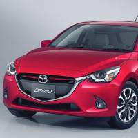 The latest version of the Demio compact by Mazda Motor Corp. won Japan\'s car of the year award Monday for 2014-15. | KYODO