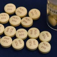 Tablets of the influenza medicine Avigan Tablet, produced by Fujifilm, are displayed in Tokyo on Wednesday. | AFP-JIJI