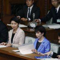 Industry minister Yuko Obuchi (second from left) attends a Lower House session Monday.  | REUTERS