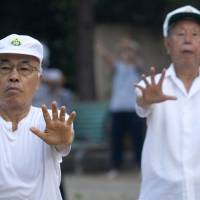 An elderly man exercises in Tokyo in September 2012. According to a recent global tally, the nation\'s retirees enjoy some of the highest standards of living in the world. | BLOOMBERG