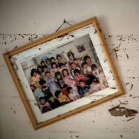 A crooked picture frame and water marks are seen on the wall of a kindergarten that was destroyed in the March 11, 2011, earthquake and tsunami in Ishinomaki, Miyagi Prefecture, in April 2011. Japan's 3/11 tsunami evacuees caught in $30 billion money trap