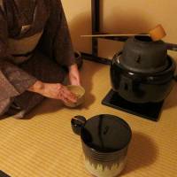 This photo provided by the Urasenke Chanoyu Center shows host Masako Soyu Miyahara purifying a tea whisk in front of guests at the institute in New York on Oct. 2. Tea ceremony offers New Yorkers respite from bustling lives