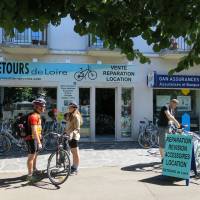 Wheeling and dealing: Tourists stand outside a bicycle shop in Blois, France, in June. Exploring France's Loire Valley on two wheels