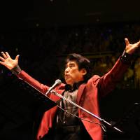 Tokyo Art Foundation Chairman Haruhisa Handa sings at the “Shingeki no Hanshin Kyojin Rock Concert,” at Nippon Budokan in Tokyo, on Sept. 26. Legendary artists rock Tokyo, raise money for charity