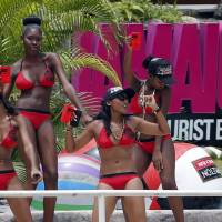 Cheerleaders dance during an international cricket match in Kingston. Growing up in New York, whether it was because of the music, the fashion, the attitude, or even that good sinsemilla, Jamaicans were the most imitated immigrant group in Brooklyn, writes Baye McNeil. | AP