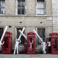 Tubular bells: Cast members from Siro-A\'s current London production pose on a West End street. | WWW.LORNAJANENEWMAN.COM