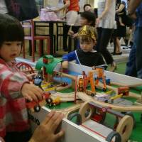 Children enjoy playing with toys from Sweden on Oct. 11 at the Embassy of Sweden in Tokyo. | CHIHO IUCHI