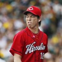 Plans postponed: Kenta Maeda was unable to prevent the Hiroshima Carp from falling at the first stage of the Central League Climax Series after finishing the regular season in third. | KYODO