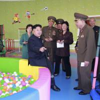 North Korean leader Kim Jong Un gives field guidance during his visit to the completed Pyongyang Baby Home and Orphanage in this undated photo released by the official Korean Central News Agency on Sunday. | REUTERS