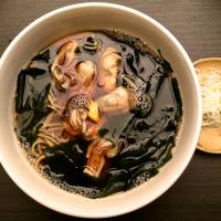 Kaki soba, the winter special, features plump oysters and wakame seaweed in a delicate hot broth. | ROBBIE SWINNERTON