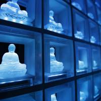 Over 2,000 crystal Buddha statues line the walls at the Ruriden, a futuristic cemetery in Tokyo. | REUTERS