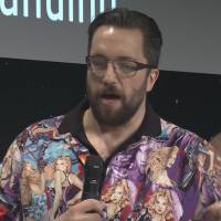 British physicist Matt Taylor sports a bowling shirt featuring pin-up girls Thursday during an interview at the satellite control center of the European Space Agency in Darmstadt, Germany. | AP