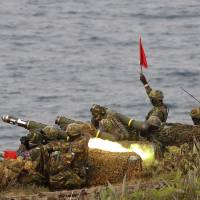Soldiers fire missiles during an annual military exercise in Penghu, west of Taiwan, in April 2013. Efforts by China\'s United Front Work Department to influence Taiwanese are viewed in Taipei as tactics of war to strip the island of its independence. | REUTERS