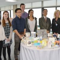 Japan\'s ambassador to the U.N., Motohide Yoshikawa (third from right) attends a ceremony Monday marking the donation of 42 books in Japanese by first lady Akie Abe to the United Nations International School in New York. | KYODO