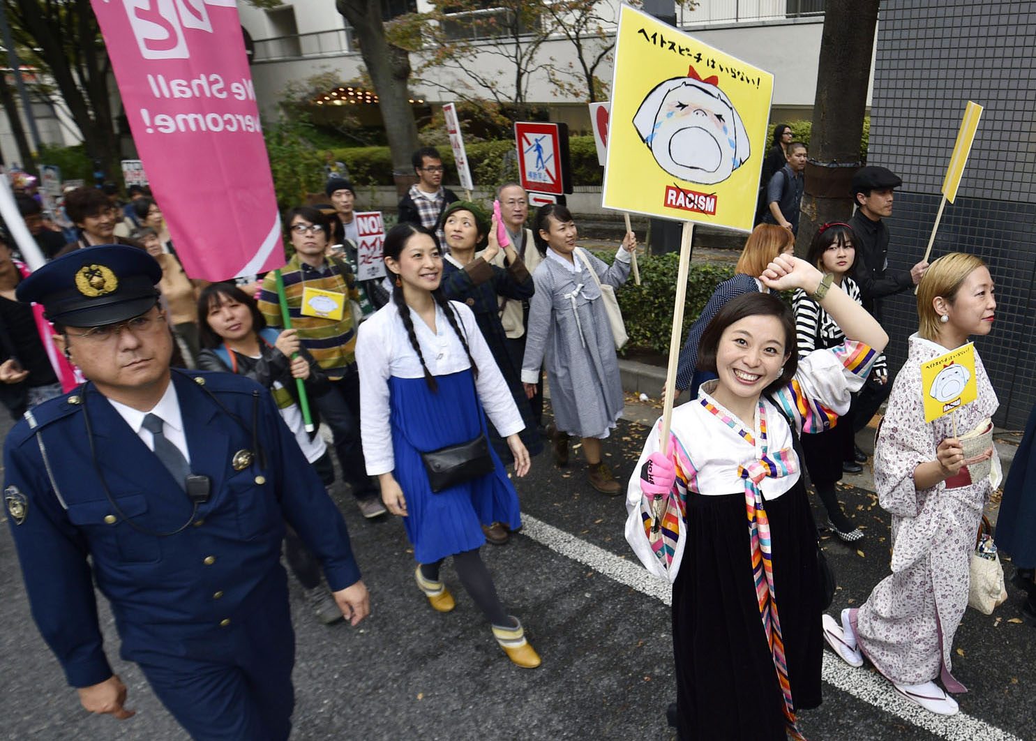 People rally Nov. 2 in Shinjuku Ward, Tokyo, against hate speech directed at Koreans. | KYODO