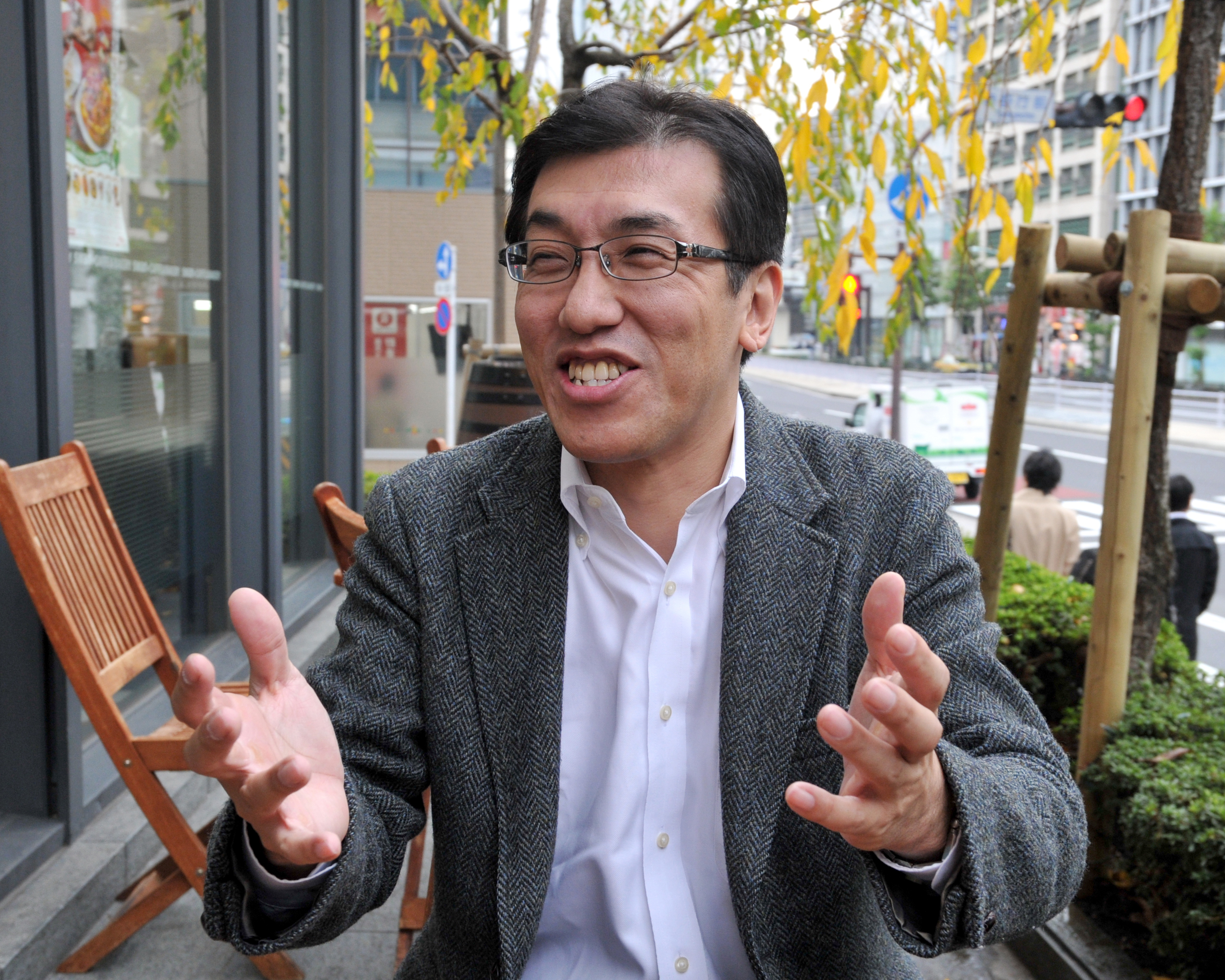 Taro Tamura, who heads the Institute for Human Diversity Japan, poses in Tokyo's Akasaka district last week. | YOSHIAKI MIURA