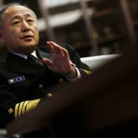 Adm. Katsutoshi Kawano, chief of the Self-Defense Forces\' Joint Staff, speaks during an interview at the Defense Ministry in Tokyo on Friday. The nation\'s highest-ranking military officer urged an early start to a \"crisis management\" mechanism with China amid conflicting claims to the Senkaku Islands. | REUTERS