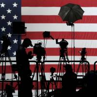 News crews set up equipment on risers before a rally on Tuesday for Tom Wolf, the Democratic governor-elect of Pennsylvania, in the Utz Arena of the York ExpoCenter in York, Pennsylvania. | AP