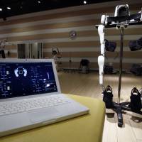 The Lower Limb Model HAL can be monitored from a laptop. This one shows data such as center of balance. | REUTERS