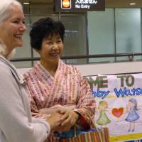 Libby Watson and Hiroko Tanaka meet for the first time in 52 years, at Narita International Airport on Friday. | SHUSUKE MURAI