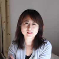 Akemi Hirose recalls her experience as a temp worker during an interview at her home in Tokyo on Nov. 4. | MIZUHO AOKI