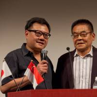 Hard-boiled partnership: Director Eric Khoo (left) and 79-year-old manga artist Yoshihiro Tatsumi. Tatsumi: Godfather of alternative manga is reborn on film