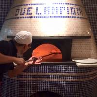 Culinary classic: Kenta Takahashi at Due Lampioni makes some of Tokyo\'s best Napoli-style pizza, using an oven flown in from just outside Naples. | ALEX DUTSON