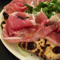 The Margherita at La Piccola Tavola and the title pizza at Massimotavio. | ALEX DUTSON