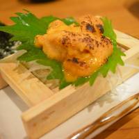 On the house: An uni (sea urchin) dish came courtesy of the restaurant ahead of a \"mountain\" of tempura when our critic visited Tottuan in Osaka. | J.J. O\'DONOGHUE