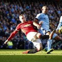 Talented but unpredictable: Manchester United star and England captain Wayne Rooney has been unable to match the prolific scoring output he\'s had for his club while playing for the Three Lions.  | REUTERS