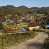 Looking across the valley at the hamlet of Yonedawa from fields in 
Keishi. | SKYE HOHMANN