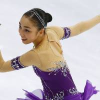 Raising the bar: Rika Hongo scored a personal-best 118.15 points in the free skate at the Cup of Russia on Saturday and won her first Grand Prix title. | AP