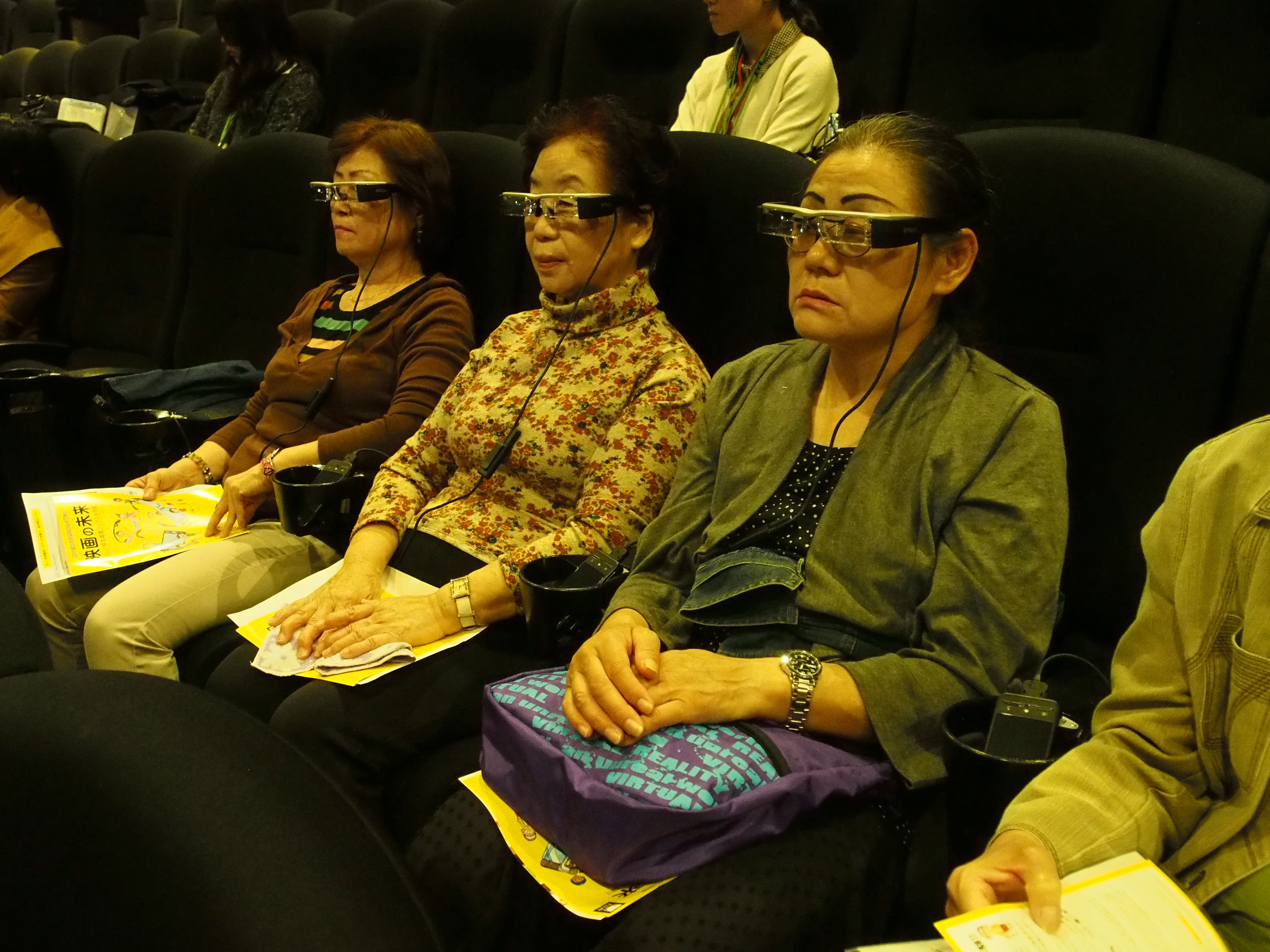 Sound and vision: A new type of head-mounted technology offers personal subtitles and descriptive audio for aurally and visually impaired moviegoers. | MASAMI ITO